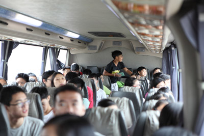 Participants enjoying their plant tour on a coach.