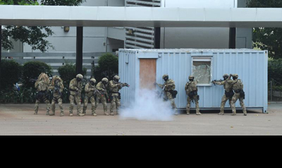 The SDU in action in a hostage rescue demonstration.